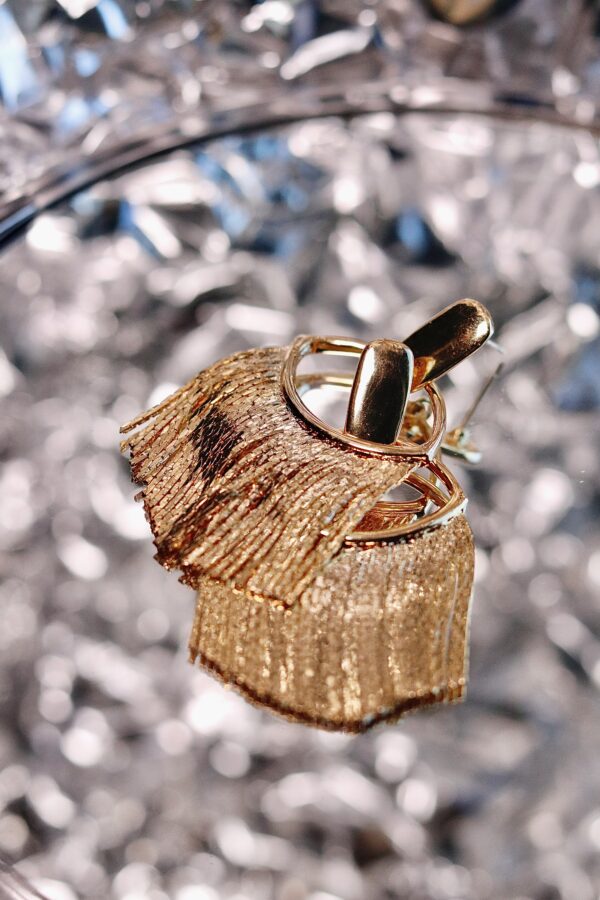"Watch what happens when candlelight hits these" Golden Tassel Earrings - Image 2